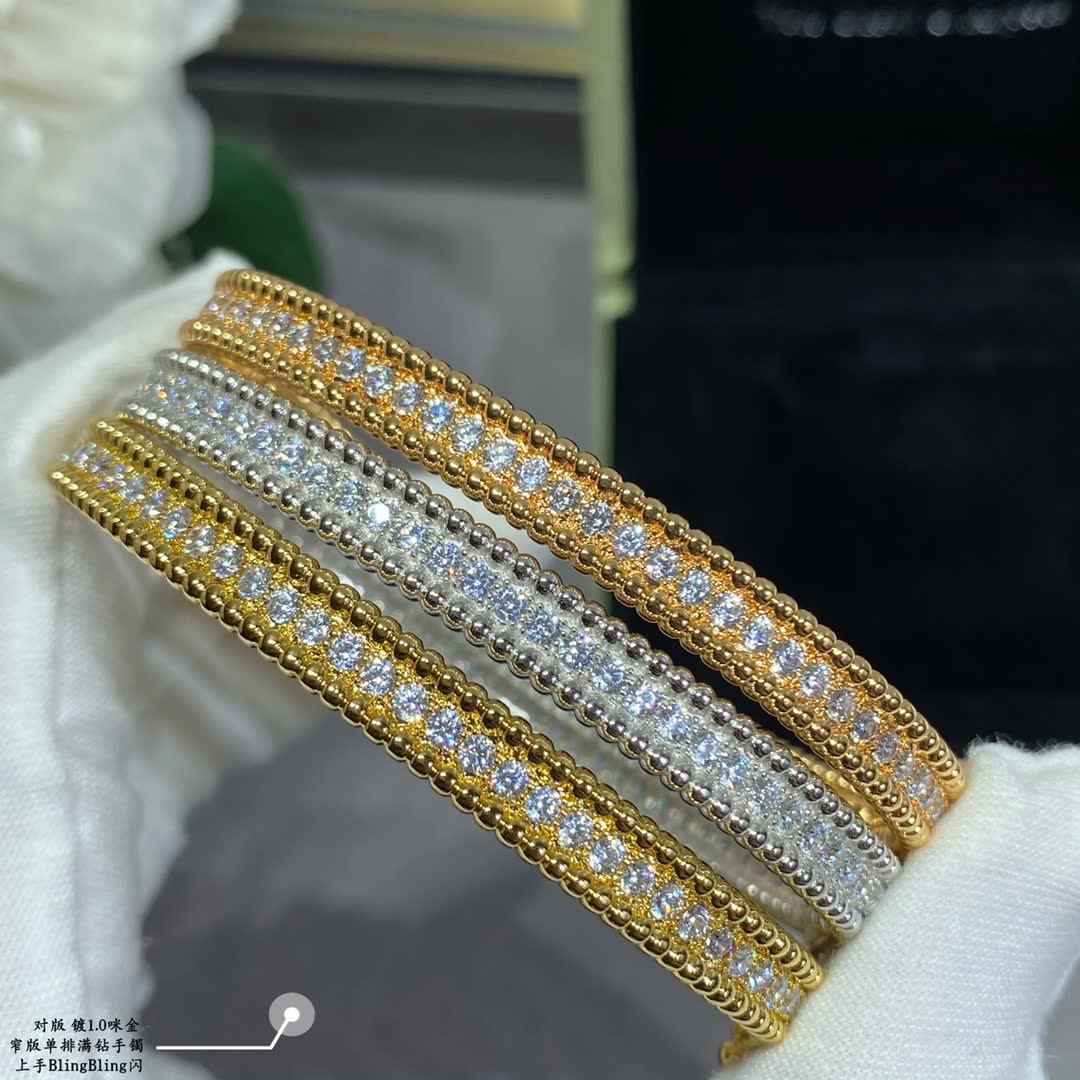 Van Cleef & Arpels Silver Diamante Flower Bangle Set